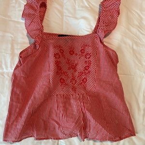 embroidered red and white top